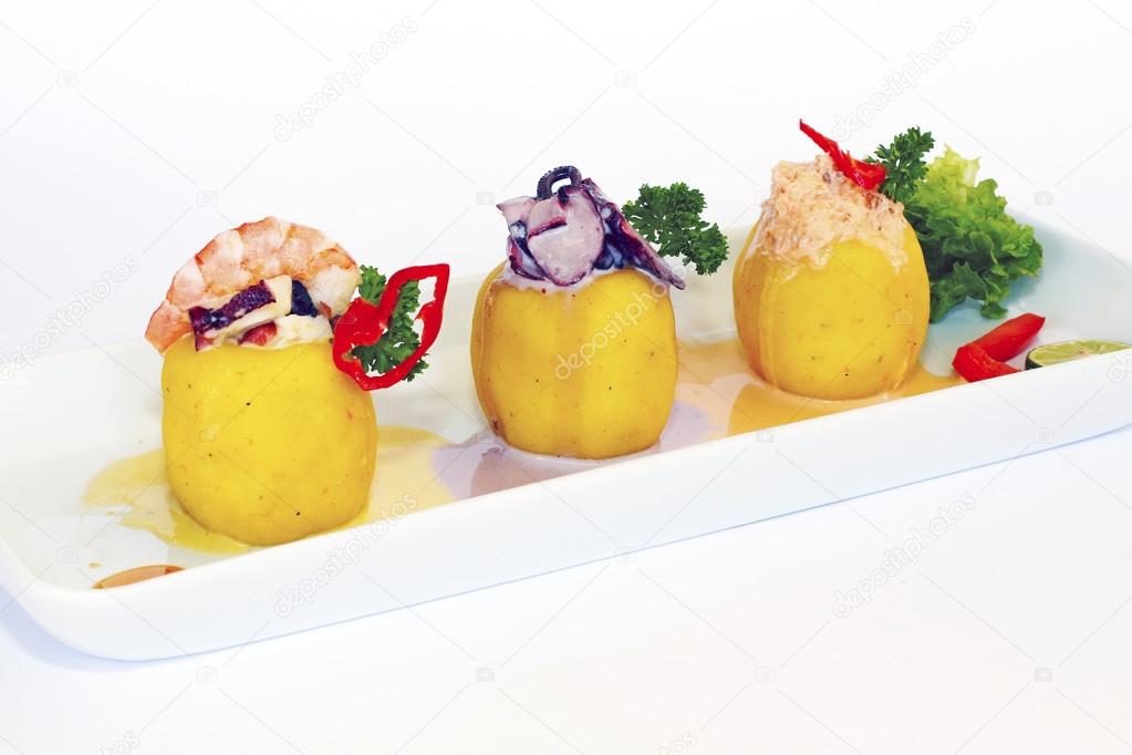 PERUVIAN culinary: trio causa rellena. Potatos dough based