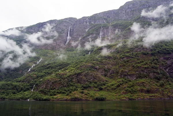 Tourism vacation and travel. Mountains and fjord  Nærøyfjord in Gudvangen, Norway, Scandinavia. — Stockfoto