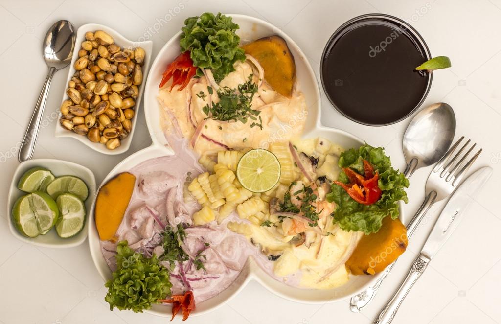 Peru Dish: 3 types of Cebiche (ceviche) with chicha drink, lemon and canchita (fried salty corn).