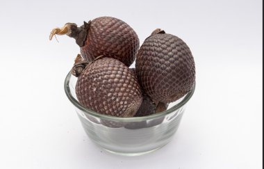 Exotic fruit of America: Aguaje or Moriche palm fruit mauritia flexuosa. clipart