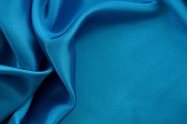 Koyu mavi kumaş dokusu arka plan, ipeğin veya keten deseninin ayrıntıları.