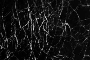 Tasarım sanat çalışmaları ve iç veya dış tasarım için kusursuz desenli yüksek çözünürlüklü siyah mermer dokusu.