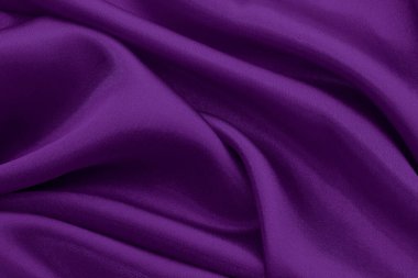 Koyu mor kumaş dokusu arka plan, ipeğin veya keten deseninin ayrıntıları.