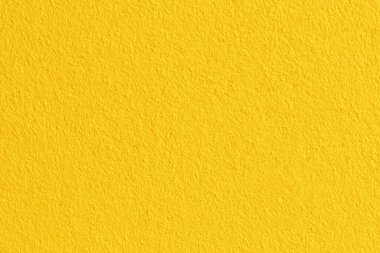 Arkaplan ve tasarım için sarı renkli beton duvar dokusu.