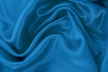 Koyu mavi kumaş dokusu arka plan, ipeğin veya keten deseninin ayrıntıları.