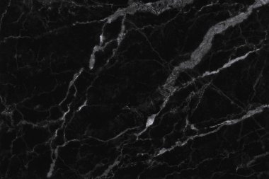 Arkaplan ve tasarım iç veya dış görünümü için yüksek çözünürlüklü siyah mermer dikişsiz doku, karşı üst görünüm.
