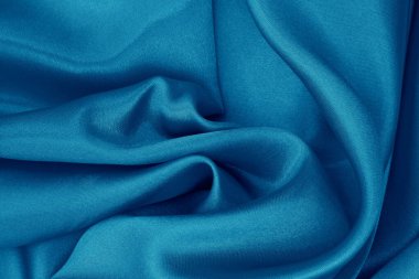 Koyu mavi kumaş dokusu arka plan, ipeğin veya keten deseninin ayrıntıları.