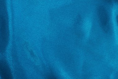Koyu mavi kumaş dokusu arka plan, ipeğin veya keten deseninin ayrıntıları.