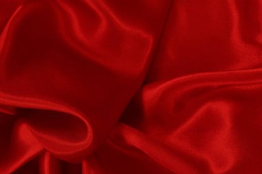 Koyu kırmızı kumaş dokusu arka plan, ipeğin veya keten deseninin ayrıntıları.