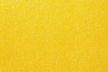 Arka plan için altın sarısı pamuk kumaş dokusu, doğal tekstil deseni.