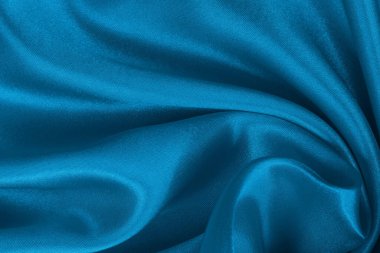 Koyu mavi kumaş dokusu arka plan, ipeğin veya keten deseninin ayrıntıları.