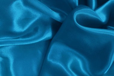 Koyu mavi kumaş dokusu arka plan, ipeğin veya keten deseninin ayrıntıları.