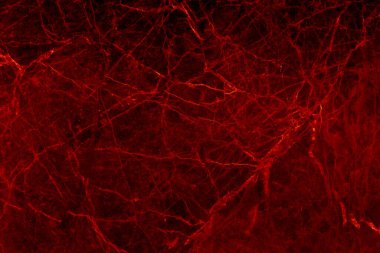 Kırmızı ve altın mermer, pürüzsüz pırıltı desenli arka plan, doğal desenli fayans taşı zemininin karşı görüntüsü..