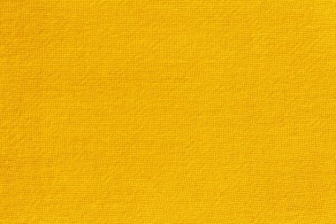 Arka plan için sarı altın sarısı pamuk kumaş kumaş dokusu, doğal tekstil deseni.