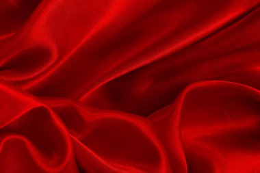 Koyu kırmızı kumaş dokusu arka plan, ipeğin veya keten deseninin ayrıntıları.