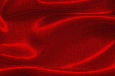 Koyu kırmızı kumaş dokusu arka plan, ipeğin veya keten deseninin ayrıntıları.