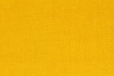Arka plan için sarı altın sarısı pamuk kumaş kumaş dokusu, doğal tekstil deseni.
