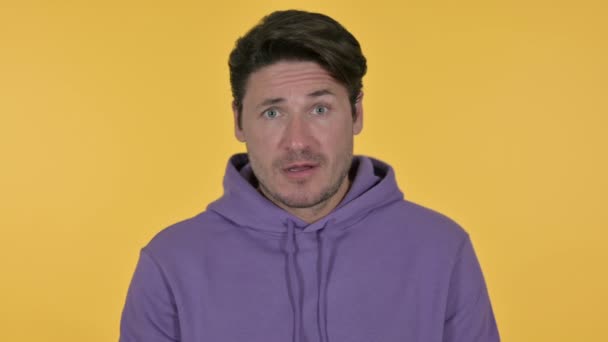 Young Man Head Shake No Sign, Yellow Background — Stock Video