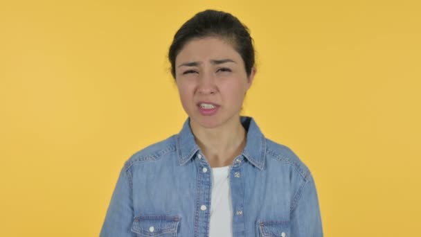 Young Indian Woman with Toothache, Yellow Background — Stock Video