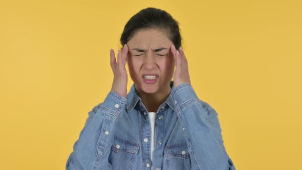 Young Indian Woman having Headache, Yellow Background — Stock Video