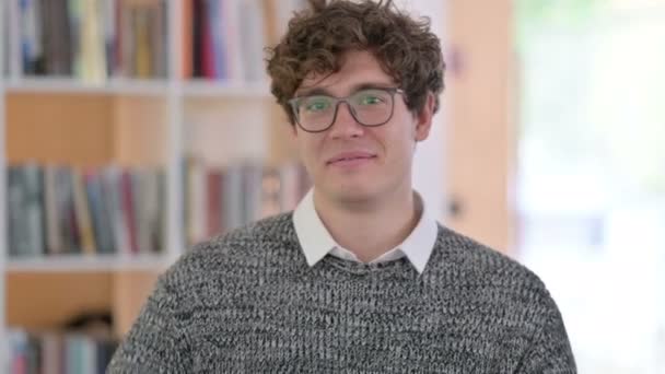 Portrait of Creative Young Man with Heart Sign by Hand — Stock Video