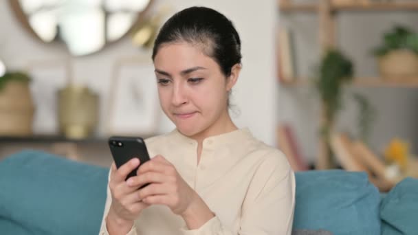 Portrait of Indian Woman Celebrating on Smartphone at Home — Stock Video