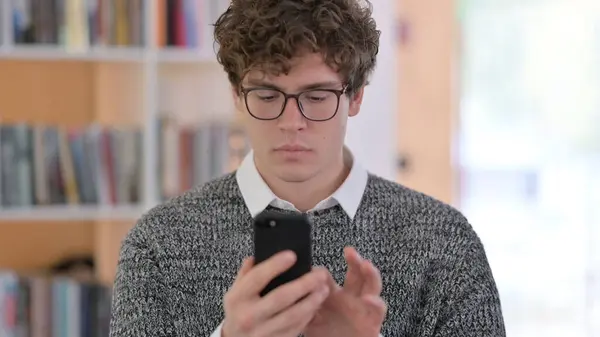 Portrait of Young Man using Smartphone — Stock Photo, Image