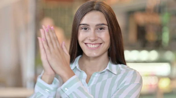 Excited Young Latin Woman Clapping, Applauding