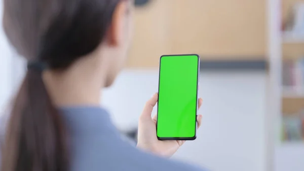 Latin Woman using Smartphone with Green Chroma Key Screen — Stock Photo, Image