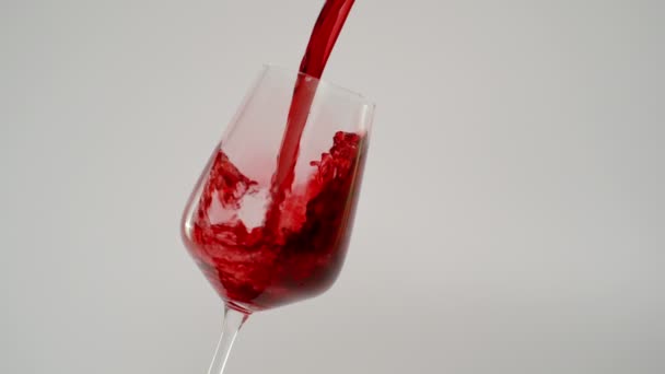Slow Motion of Red Wine Splashing in Glass at 1000 fps — Stockvideo