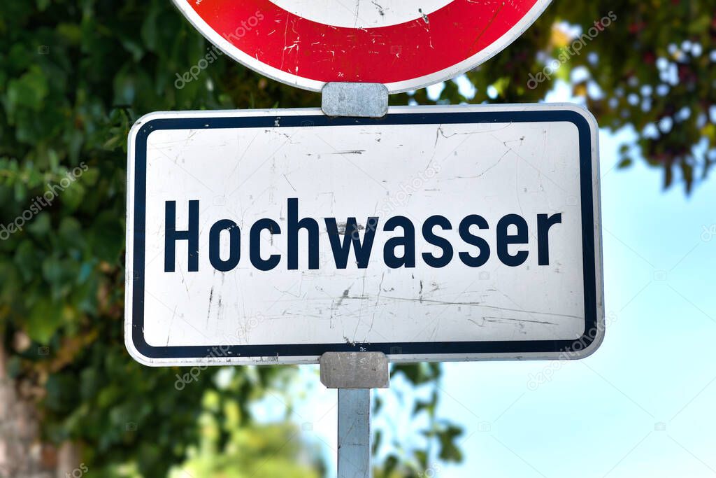 German water flood sign at Rhine river saying 'Hochwasser'