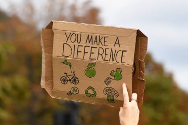 Heidelberg, Germany - 24th September 2021: Sign saying 'You make a difference' Global Climate Strike demonstration  clipart