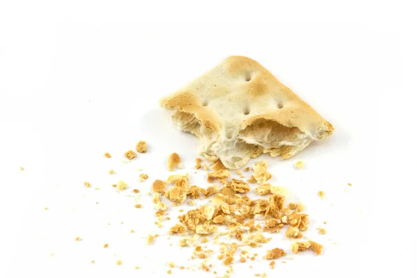 Cracker with a bite and crumb isolated — Stock Photo, Image