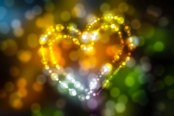 Heart with defocused lights on abstract colorful bokeh, valentin — Stock Photo, Image