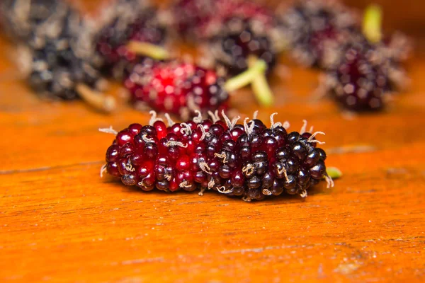 Mulberry  on wooden background — Stock Photo, Image