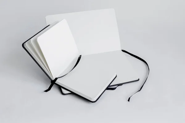 Two Black Notebooks Blank White Pages Dark Ribbons Bookmarks Lie — Stock Photo, Image