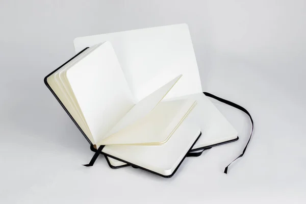 Two Black Notebooks Blank White Pages Dark Ribbons Bookmarks Lie — Stock Photo, Image