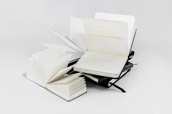 Unfold Notebooks Lie Top Each Other Fan Open Notepads Blank — Stock Photo, Image