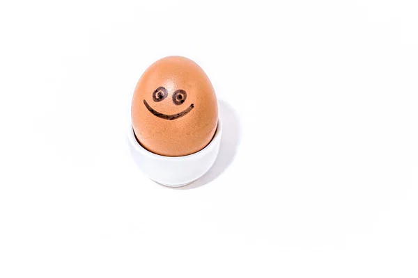One Brown Chicken Egg Positive Face Smiling Egg Stand White — Stock Photo, Image