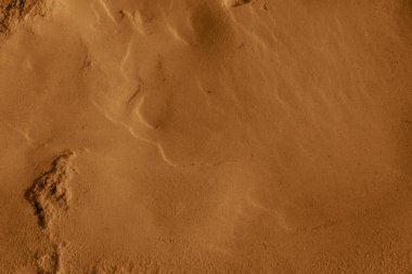 Altın turuncu parıldayan toz, kum, parıltılı göz farı. Doku. Rahatlama arka planı