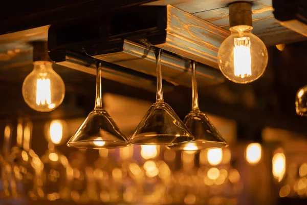 Martini Glasses Hang Upside Bar Several Lamps Warm Light Restaurant — Stock Photo, Image