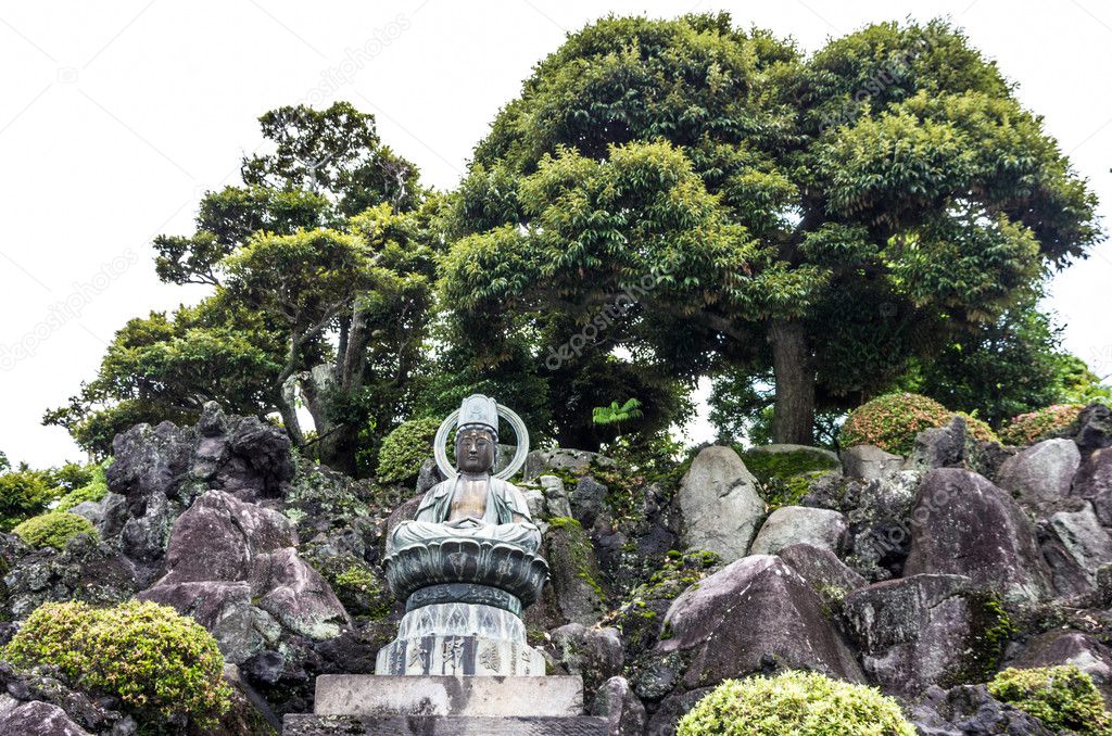 A Buddha Overlooks the Temple Grounds