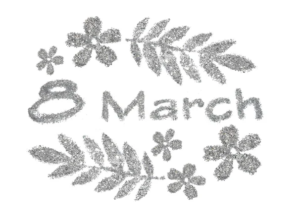 Texto 8 Marzo, bonitas florecitas y hojas de brillo plateado sobre fondo blanco. Se puede utilizar como un elemento interesante para su diseño o como tarjeta de felicitación — Foto de Stock
