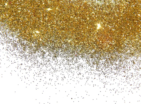Guld glitter glitter på vit bakgrund — Stockfoto