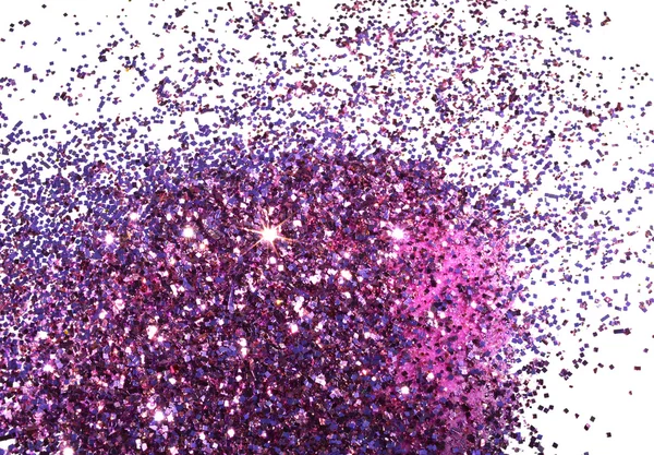 Paillettes violettes scintillent sur fond blanc — Photo