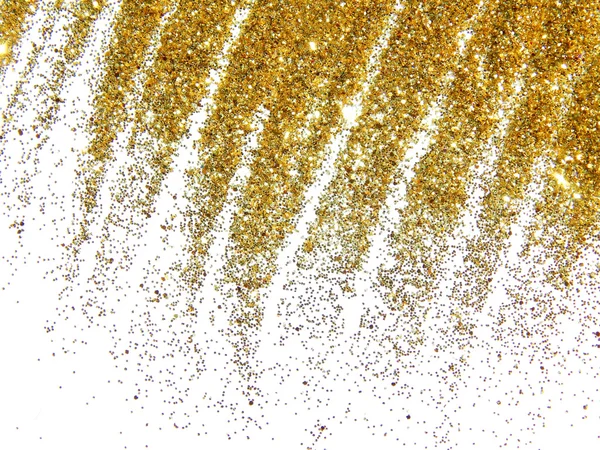 Gouden glitter schitteren als een gouden regen op witte achtergrond — Stockfoto