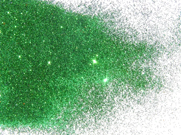 Зелений блиск іскри на білому фоні — стокове фото