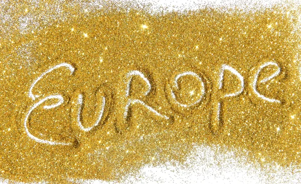 Inscription Europe on golden glitter sparkles on white background