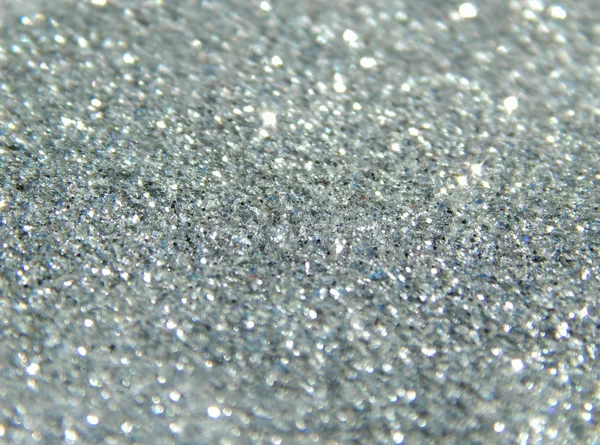 Blurry background of silver glitter sparkle — Stock Photo, Image