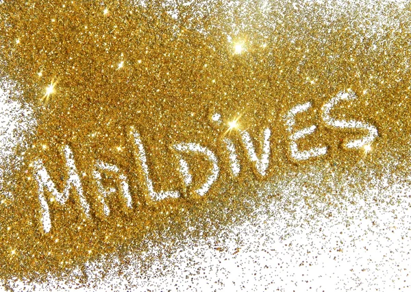 Inscription Maldives on golden glitter sparkle on white background